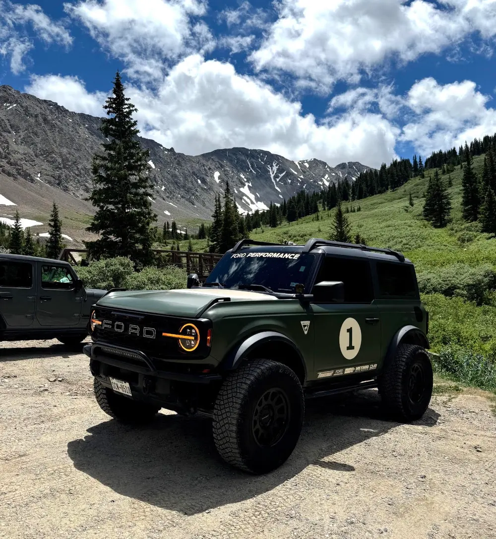 Marco's Ford Bronco parked in the mountains